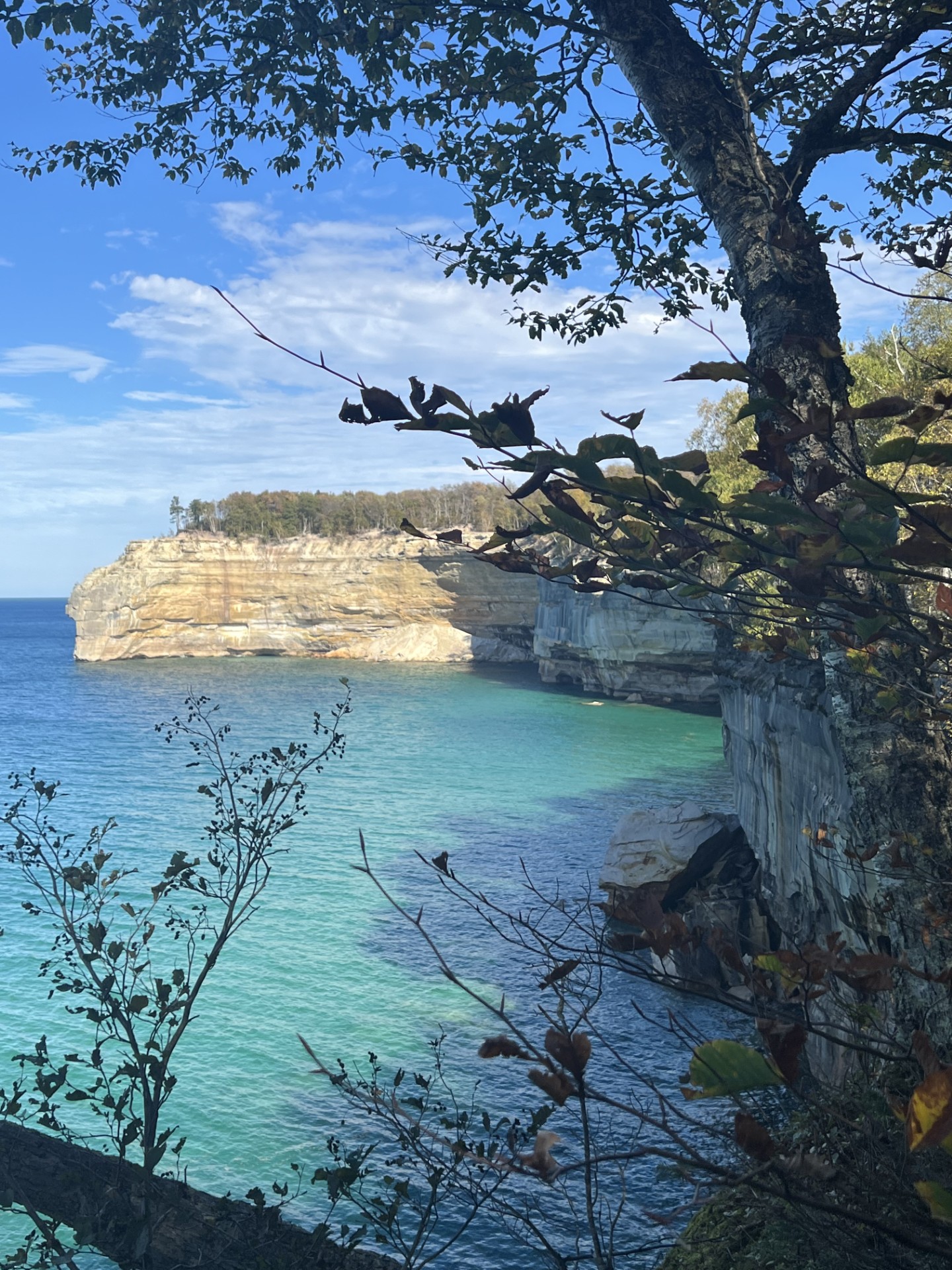 Pictured Rocks sandstone cliffs along turquoise Lake Superior waters